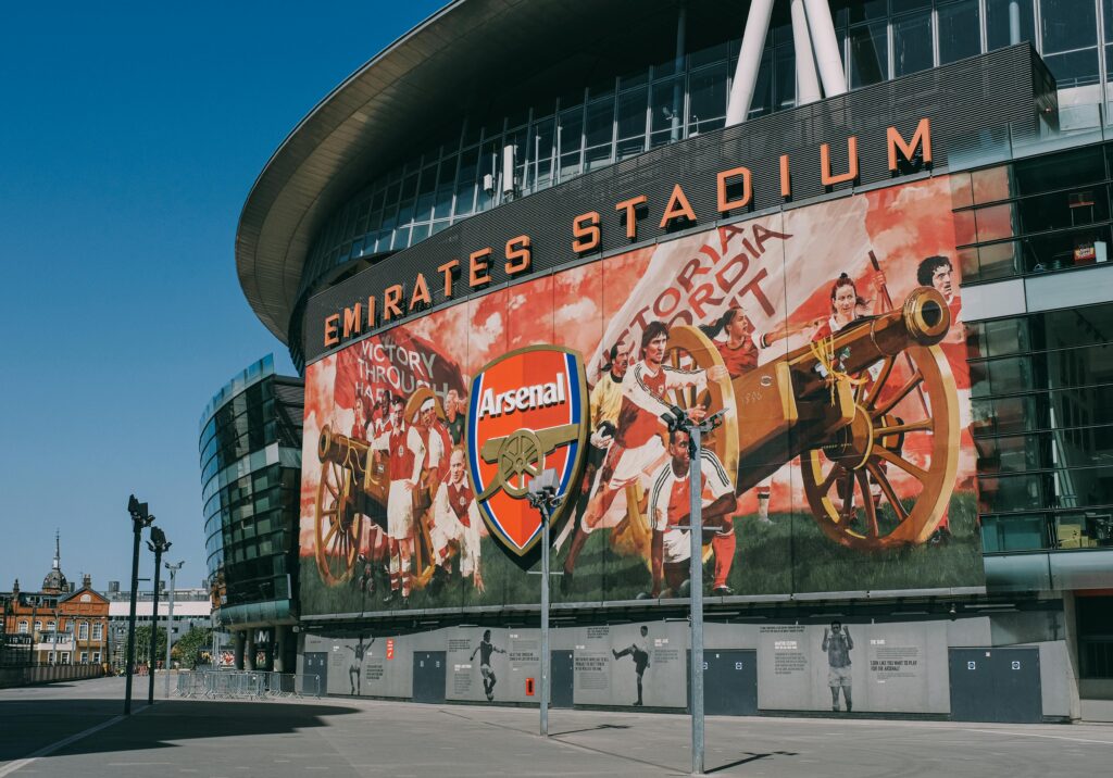 Exterior view of the iconic Emirates Stadium, home of Arsenal FC in London, England.